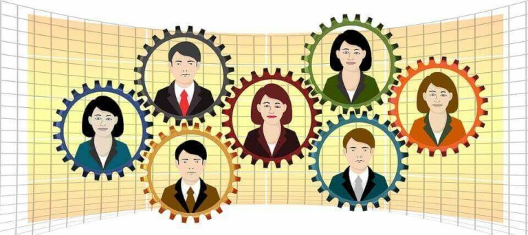 An illustration shows seven people with various hairstyles and clothing inside interlocking gears, symbolizing workplace mentoring. They are positioned in front of a grid background. The gears, placed in two rows with three on top and four below, represent the interconnected elements of SAP SuccessFactors tools.