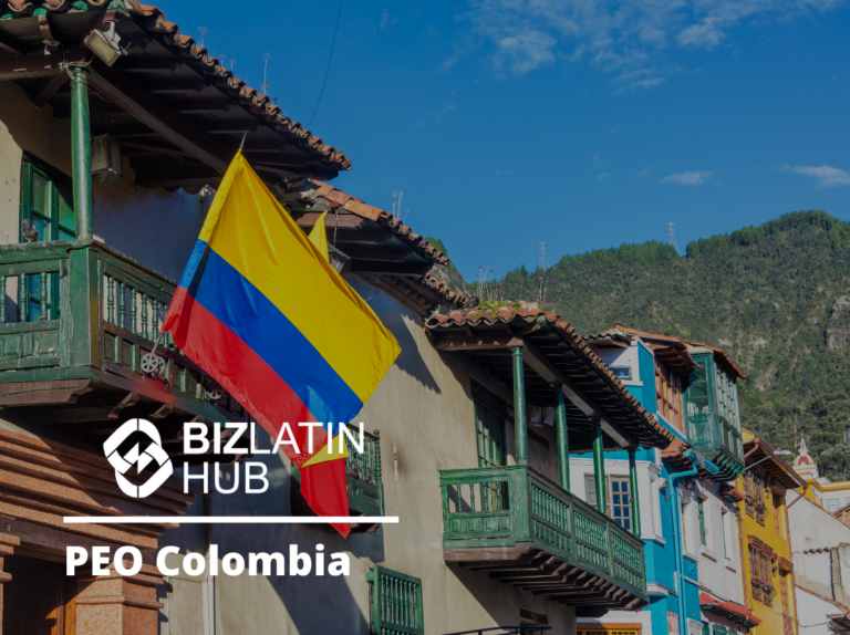 An image showing traditional Colombian buildings adorned with balconies and the Colombian flag. The sky is clear blue, and there are green hills in the background. The logos and text read, "BIZLATIN HUB" and "Professional Employer Organization in Colombia.