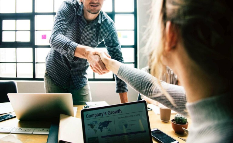 Two people shaking hands