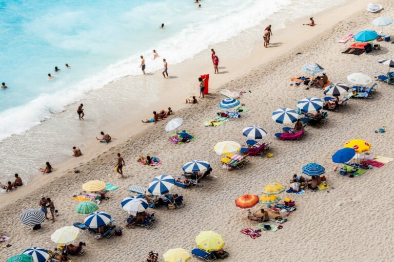 People enjoying the beach, a common hotspot for tourism in Ecuador