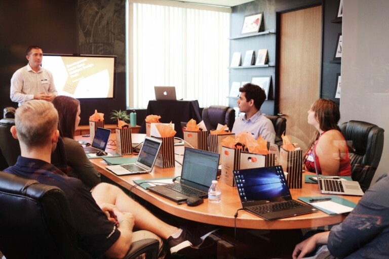 People sitting around a boardroom table