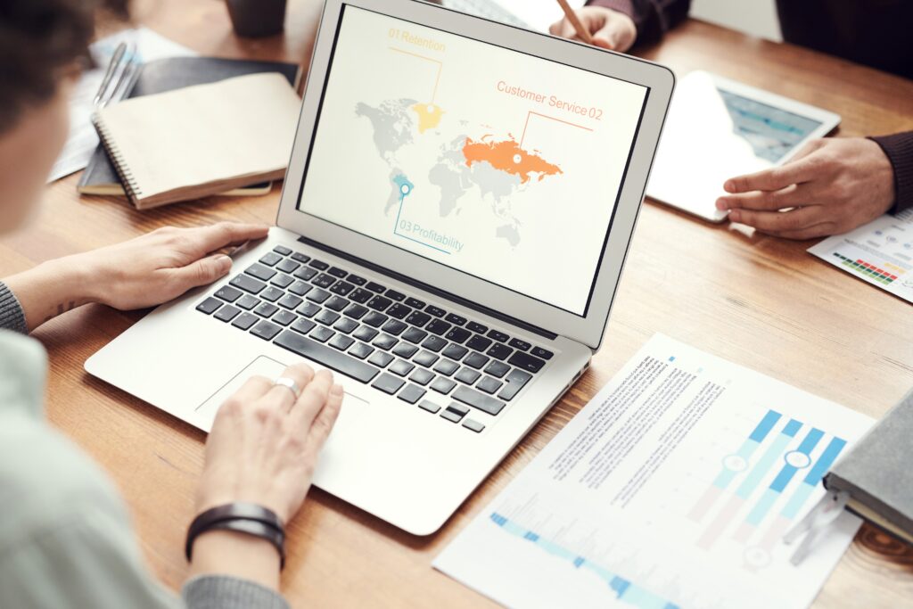 Woman using her laptop to search information about international tax minimization 