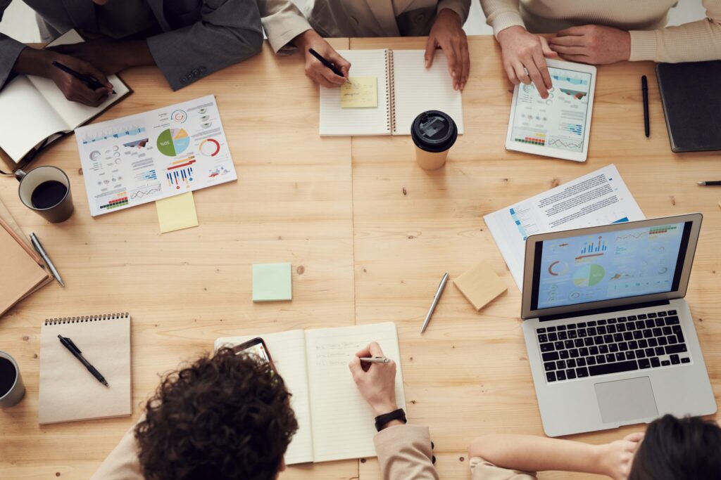 Group of people in an office undertaking a due diligence process in Uruguay. 