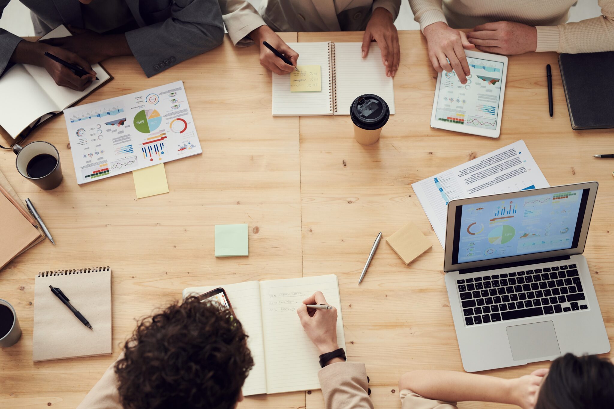 Group of people in an office undertaking a due diligence process in Uruguay.