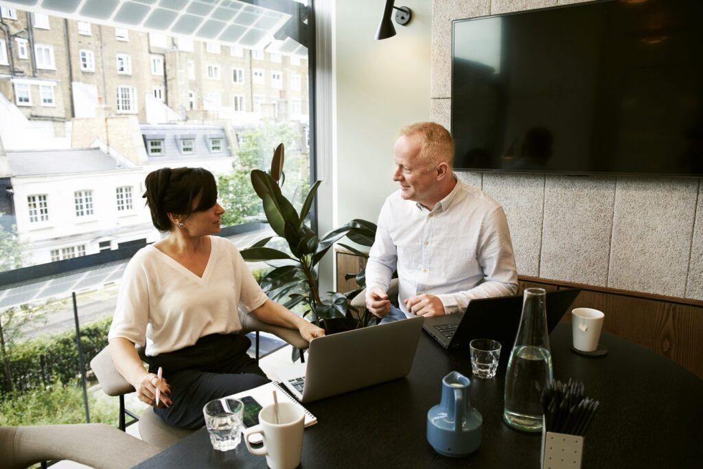 A man and a woman discussing about PEO. 