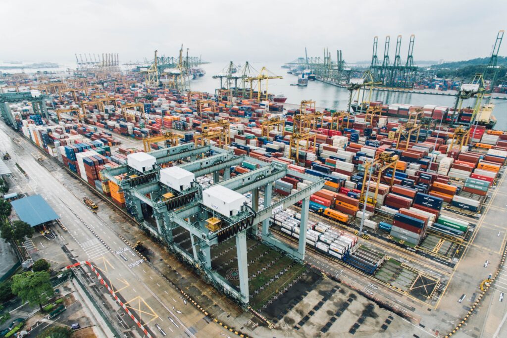 Sea port full of containers, where people are required to compny with Import and Export Regulations in Belize.