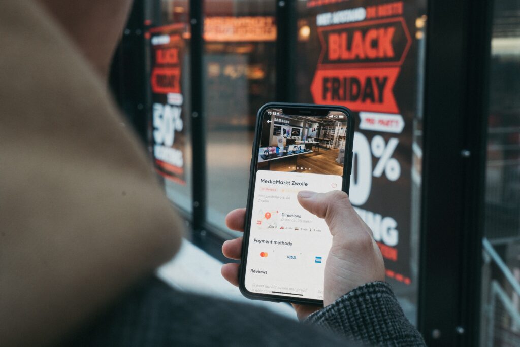 Man using his cellphone to purchase a product, representing tech companies in Mexico that are adapting to digital technology. 