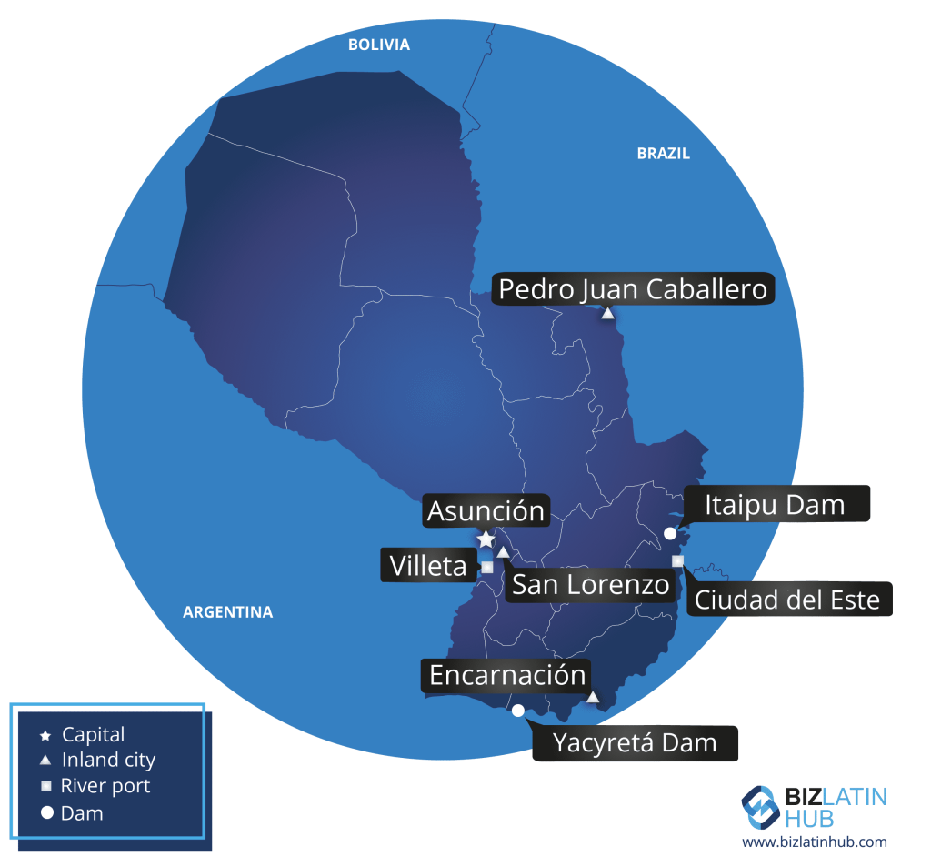 A map of Paraguay showcasing major cities and landmarks, including Asunción (capital), Pedro Juan Caballero, Villleta, San Lorenzo, Ciudad del Este, and Encarnación. Landmarks like the Itaipu Dam and Yacyretá Dam are also highlighted. The map features a blue background with a nod to bitcoin in Paraguay.