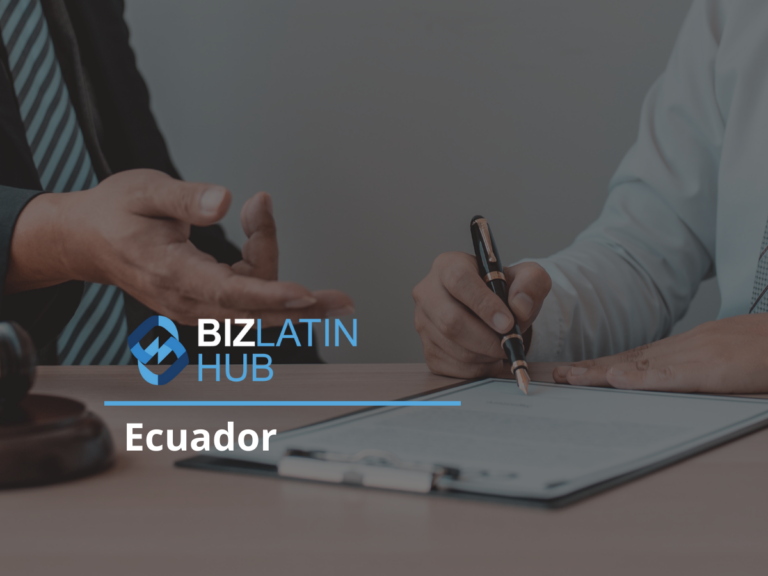 Two individuals seated at a table, one writing on a document and the other gesturing with an open hand. The text "BIZLATIN HUB Ecuador" appears on the image. A gavel is partially visible on the table, highlighting entity annual compliance in Ecuador.