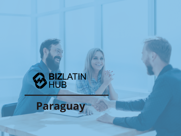 Three people are sitting at a table in an office setting. Two men are shaking hands while a woman sits in the middle, smiling. The image has a blue overlay with the Biz Latin Hub logo and the word "Paraguay" displayed prominently, showcasing tendências de recrutamento no Paraguai.