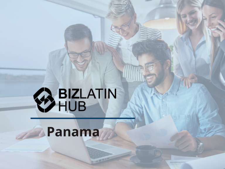 A group of five people, four standing and one sitting, are gathered around a laptop on a table. The standing individuals are smiling and looking at the screen. The man sitting is holding papers. Text on the image reads "BIZLATIN HUB Panama: Exploring Hiring Trends in Panama.