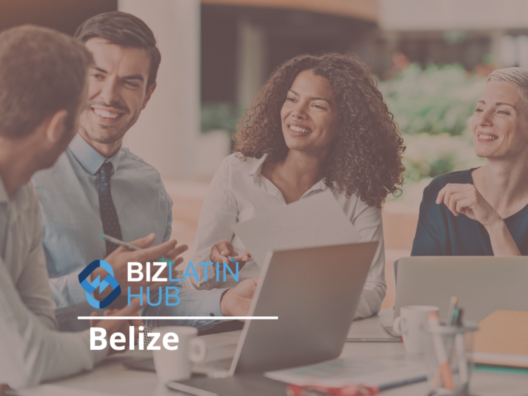 A group of four people sitting at a table in an office setting, engaged in a lively discussion about establishing an offshore company in Belize. Papers, pens, and laptops are on the table. The Biz Latin Hub logo and the word "Belize" are prominently displayed in the bottom left corner.