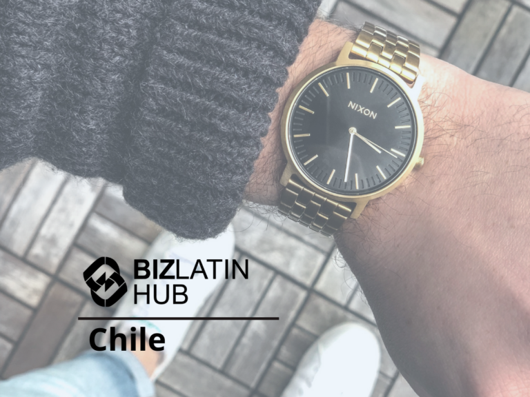 A person is wearing a gold wristwatch with a black face and the brand name "Nixon" displayed. The person's arm is dressed in a knitted sweater, and they are standing on a tiled floor. The text "BizLatin Hub Chile" is placed over the image, subtly hinting at labor reform in Chile.