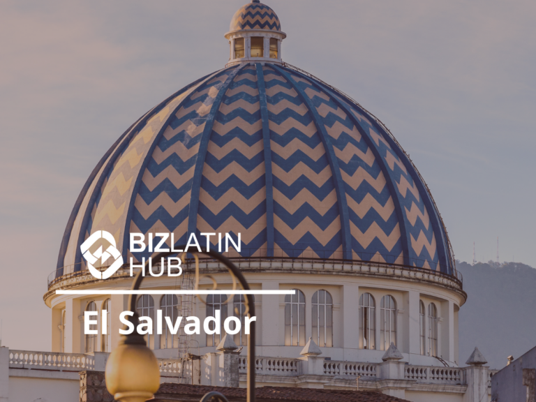 A large dome with a blue and white zigzag pattern stands atop a building in El Salvador. The BizLatin Hub logo, often associated with services like "tipos de visto na Colômbia," and the text "El Salvador" are prominently displayed on the left side of the image. The background shows a cloudy sky and distant hill.