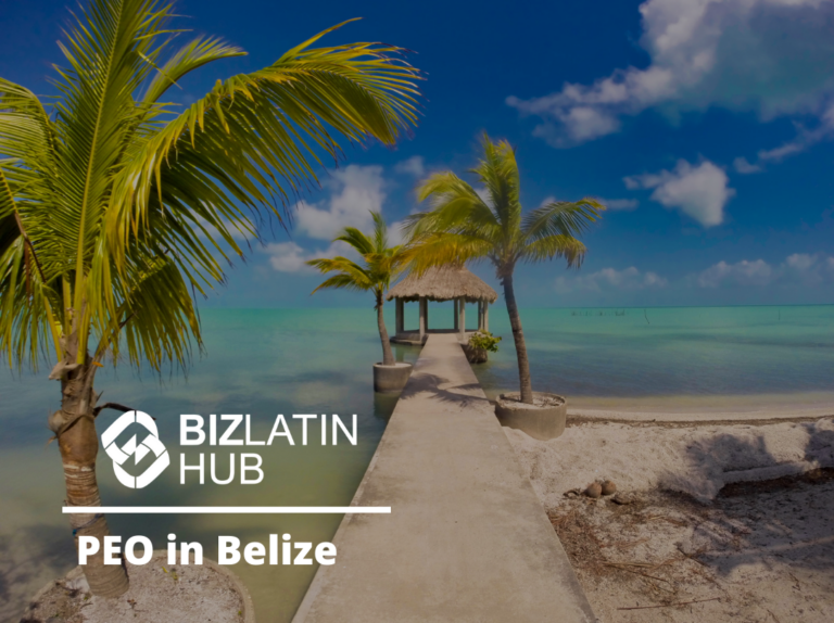 A sandy pathway lined with palm trees leads to a small thatched-roof hut overlooking clear turquoise waters under a blue sky. The text reads "BizLatin Hub" and "PEO Belize" on the bottom left corner.