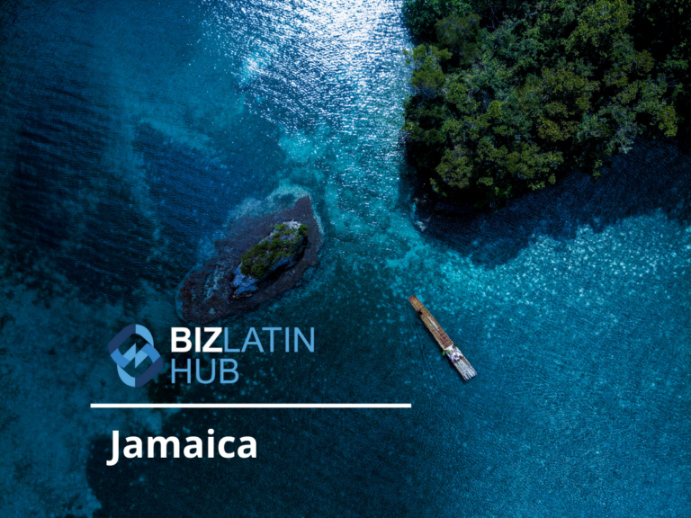 A bird's-eye view of a clear blue ocean with visible coral reefs and a small boat near a lush, green island. The image has the text "Biz Latin Hub" and "Open a Corporate Bank Account in Jamaica" at the bottom left corner.