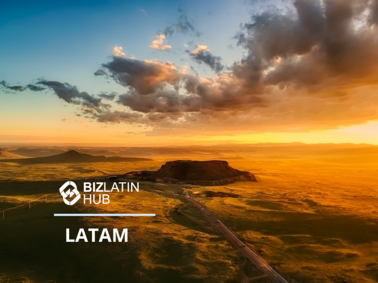 A landscape image features a vast, green plain with a prominent plateau on the horizon. The sky is partly cloudy with a golden hue from the setting sun. In the foreground, the words "Biz Latin Hub" and "LATAM" are displayed, subtly highlighting discussions about minimum salary in Latin America.