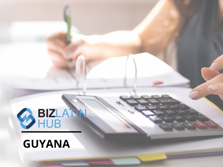 A close-up of a person using a calculator and writing notes on a clipboard, with "BIZ LATIN HUB" and "GUYANA" visible in the lower left corner. The softly blurred background emphasizes the focus on accounting and taxation documents in Guyana.